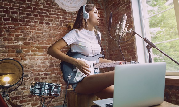 Woman Playing Guitar